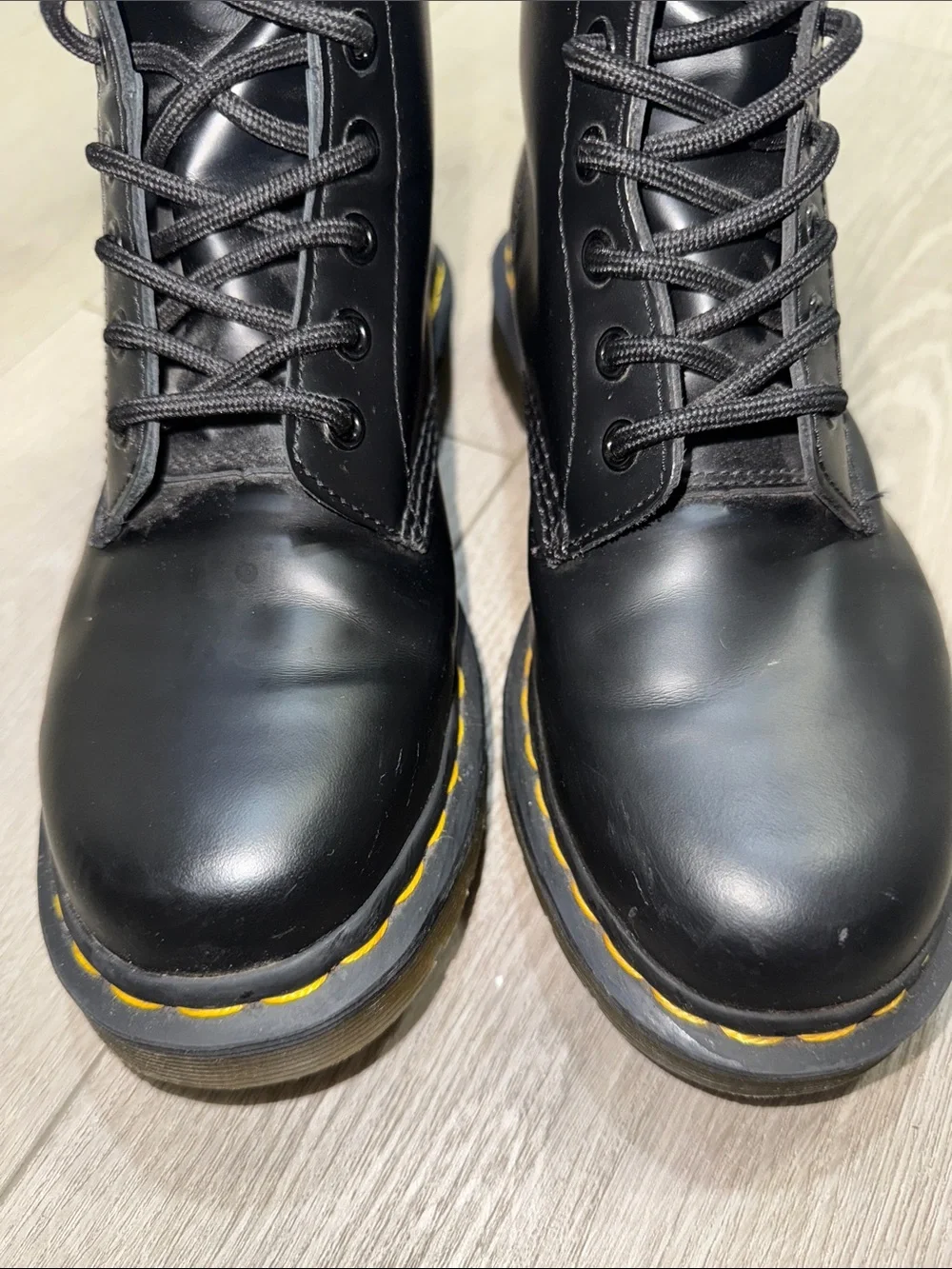 Dr. Martens Black Leather 8-Eye Lace-Up Boots with Yellow Stitching